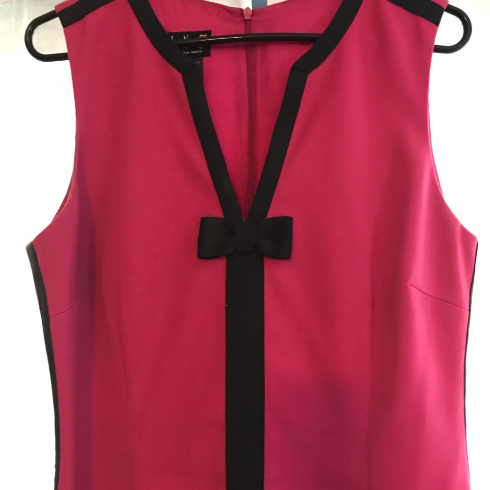 Inc pink dress with black trim.